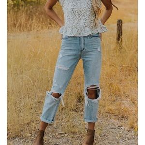 Roolee Tom high rise distressed Jeans. Medium. Look at size chart attached!
